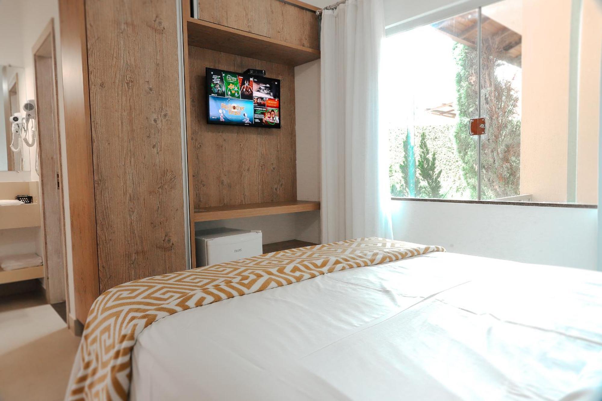 Pousada Kanto Suites & Spa Capitolio Bagian luar foto